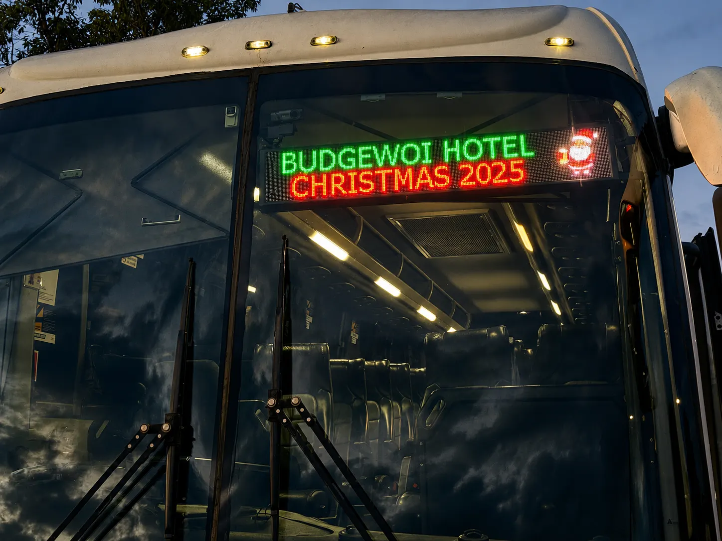 LED destination display installed at the front of a charter bus.